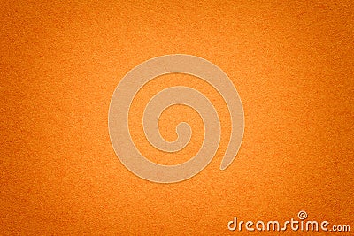 Texture of old orange paper background, closeup. Structure of dense cardboard Stock Photo