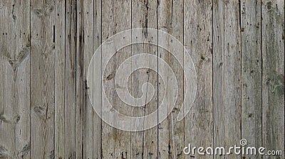 The texture of weathered wooden wall. Aged wooden plank fence of vertical flat board Stock Photo