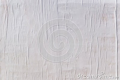 Texture of wet white folded paper on an outdoor poster wall, crumpled paper background Stock Photo