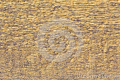 Texture wooden board painted yellow and outdated by the time Stock Photo