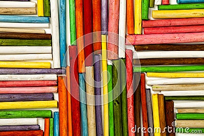 Texture of wooden sticks colored. Direction towards the center. Stock Photo