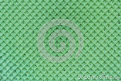 Textured abstract background. Colourfull green waffle. Close up. Flat lay Stock Photo