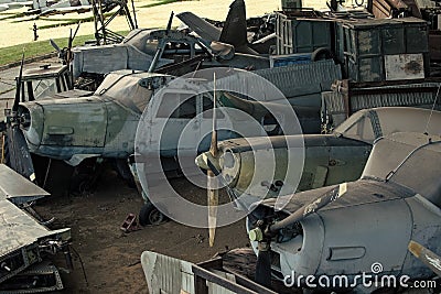 Textured grunge old planes, scrap metal background. Old planes not able to fly, stands in museum of aviation or garbage Editorial Stock Photo