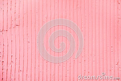 textured pink background with plaster vertical lines and stripes Stock Photo