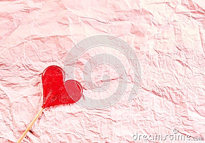 Textured pink crinkled paper Valentines background Stock Photo