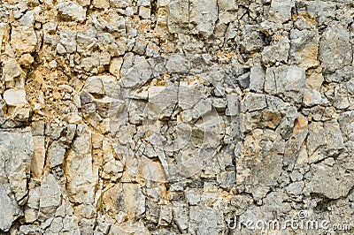 Textured stone background Rubble ballast in natural form in the rock wall Stock Photo