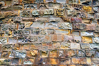 Textured stonework wall with varying colours Stock Photo