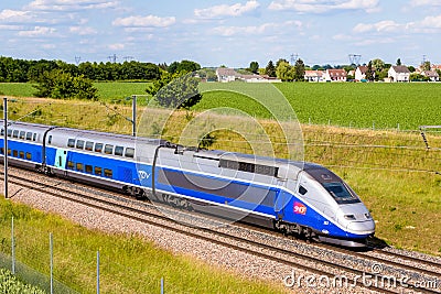 A TGV high speed train in the countryside Editorial Stock Photo