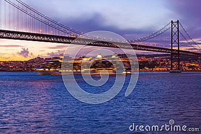 25th of April Bridge and ship - Lisbon Portugal Stock Photo