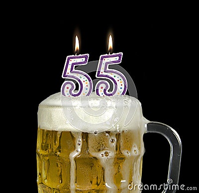 55th birthday candles in beer Stock Photo