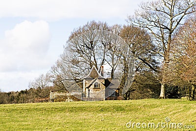 An 18th century English farmhouse in winter Stock Photo