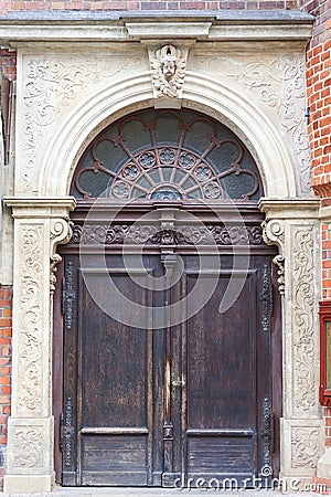 14th century gothic St. Elisabeth Church, wooden door, Market Square, Wroclaw, Poland Stock Photo