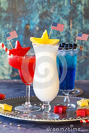 4th of July cocktails with fresh fruit and patriotic flag garnishments. Stock Photo