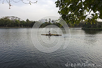 12TH MARCH 2022, rABINDRASAROBAR, KOLKATA, WEST BENGAL, INDIA: An athlete practicing rowing sports at Rabindra Sarobar lake Editorial Stock Photo