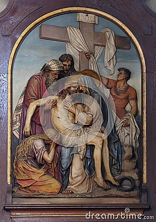 13th Stations of the Cross,Jesus ` body is removed from the cross Stock Photo
