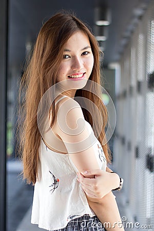 Thai adult beautiful girl relax and smile Stock Photo