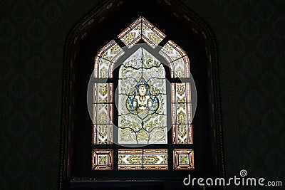 Thai art on window of Church at Wat Benchamabophit. Stock Photo