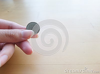 Thai baht coin in hand Stock Photo