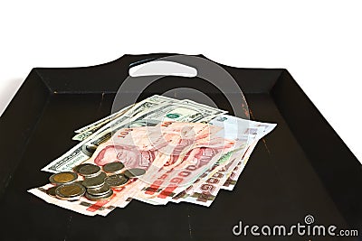 Thai bahts and US dollars Stock Photo