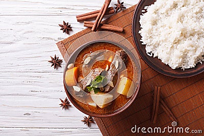 Thai beef massaman curry and rice side dish. horizontal top view Stock Photo