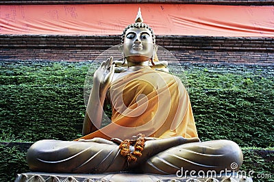 Thai buddhas in green Stock Photo