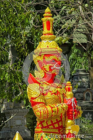 Thai Buddhist Temple Guardian Giant Suriyaphob red statue Stock Photo