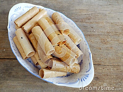 Thai coconut cracker roll on wooden background Stock Photo