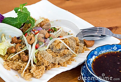 Thai crisp fried catfish salad Stock Photo