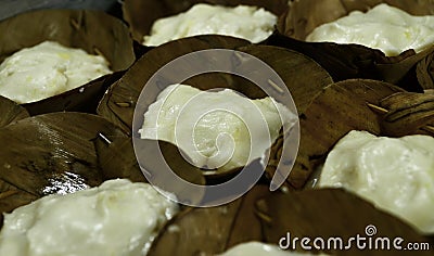 Thai desserts wrapped in banana leaves, taste sweet, fragrant, delicious Stock Photo