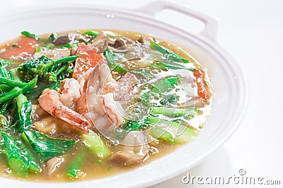 Thai Dishes called `Rad Na`, Wide Rice Noodles Seafood in Gravy, Chinese food Stock Photo