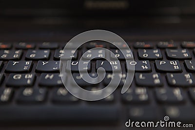 Thai-english keyboard on laptop computer Stock Photo