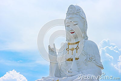 Thai famous big white bodhisattva guanyin statue with copy space sky background at Wat Huai Pla Kung temple, Chiang rai Stock Photo