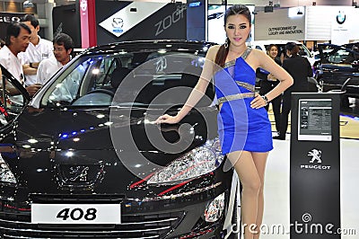 A Thai female presenter next to a Peugeot 408 Editorial Stock Photo