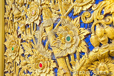 Thai flower pattern emboss woodcraft. Stock Photo