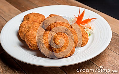 Thai Food Fried Shrimp Cake Tod Mun Kung on white plate Stock Photo