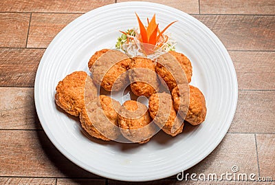 Thai Food Fried Shrimp Cake Tod Mun Kung on white plate Stock Photo