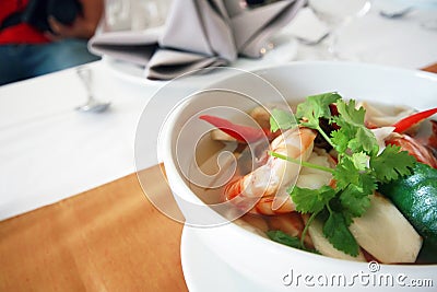 Thai food Tom Yum Kung in a bowl Stock Photo