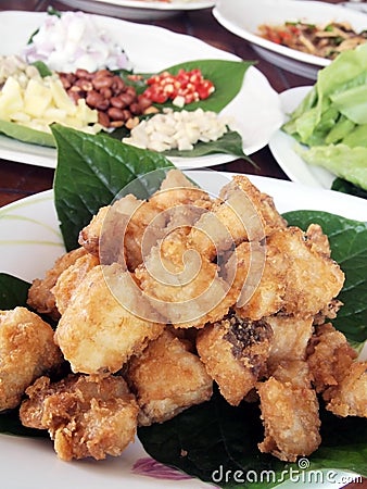 Thai fried fish wrapped. Stock Photo