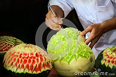 Thai fruit carving with hand, Vegetable and Fruit Carving Stock Photo