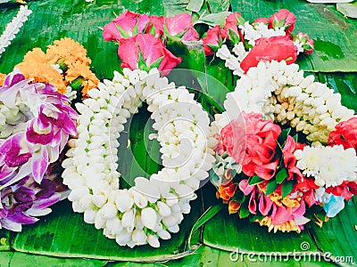 Thai garlands are on sale at a storefront in Bangkok, Thailand. Stock Photo