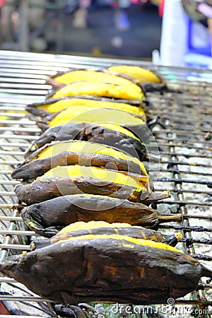 Thai Grilled bananas on the grill. Stock Photo