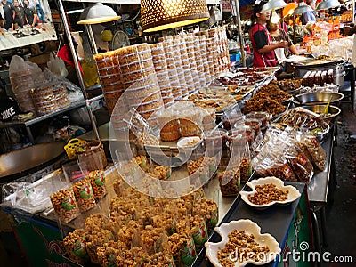 Thai local market,shellfish pickle,dry squid,shrimps,pork,fish,mushrooms and more Editorial Stock Photo