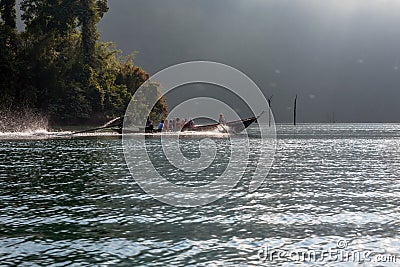 Thai long-tail boat on Cheow Lan lake Editorial Stock Photo