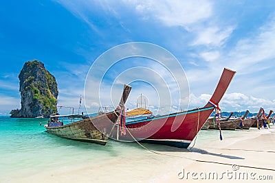 Thai long tail boats on the beach with beautiful island Stock Photo