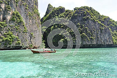 Thai long tale boat in the ocean with tourists Stock Photo