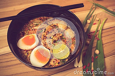 Thai noodle soup in a bowl taste spicy noodle soup and boiled eg Stock Photo