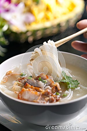 Thai Noodle Soup with Crispy Pork Stock Photo