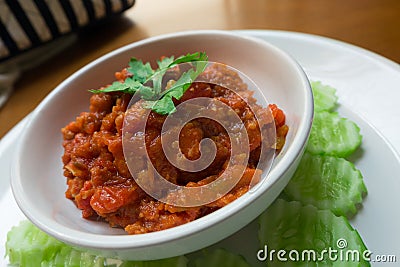 Thai Northern Style minced Pork and Tomato Relish paste dip. Nam Prik Ong. Stock Photo