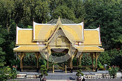 The Thai Pavilion in front of towering trees at Olbrich Botanical Gardens in Madison, Wisconsin Stock Photo