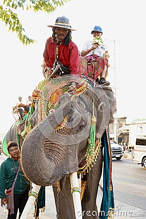 Thai people, elephant and mahout parade Pavilion at a wat par Lahansai temple , 31 January 2024 , Buriram Thailand Editorial Stock Photo